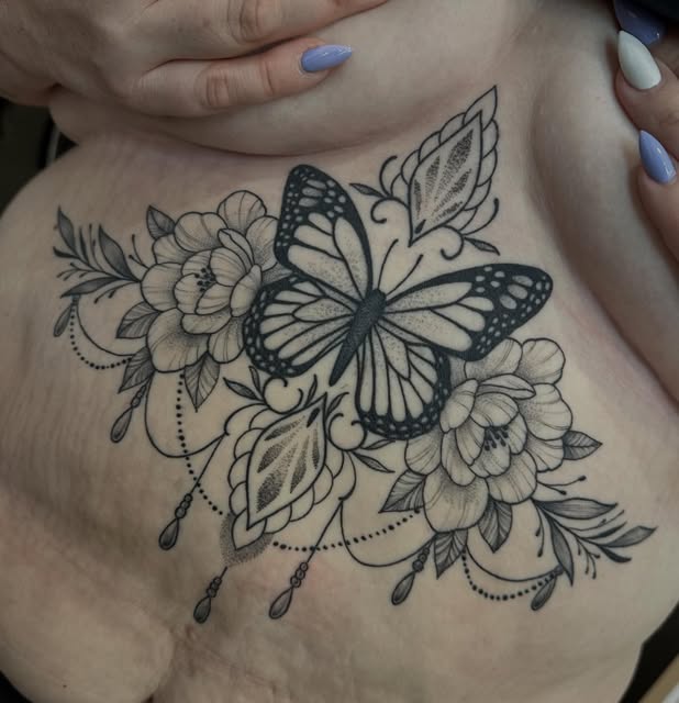 Floral and monarch butterfly piece by Savanna Blair