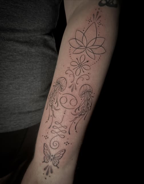 Jellyfish and lotus forearm piece by Savanna Blair